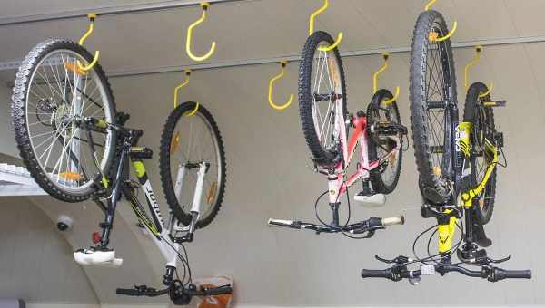 Крепления для велосипеда на стену: виды, советы по выбору и установке